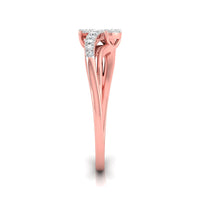 A rose gold ring with a curved, sculptural band and a small cluster of clear stones at the top, shown on a clean white background.