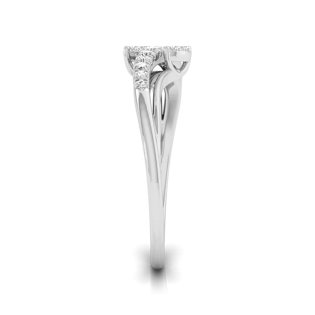 A silver-toned diamond ring with a three-stone setting, featuring a small pavé diamond accent on the left side of the top, shown on a plain white background. white gold