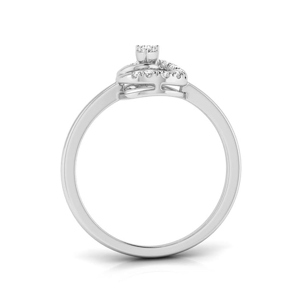 A silver-toned diamond ring with a round center stone and a small halo of accent diamonds, shown from a side profile view on a white background. white gold