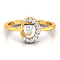 A yellow gold ring with a double spiral design, featuring a central pear-cut diamond and a halo of round diamonds on a clean white background.