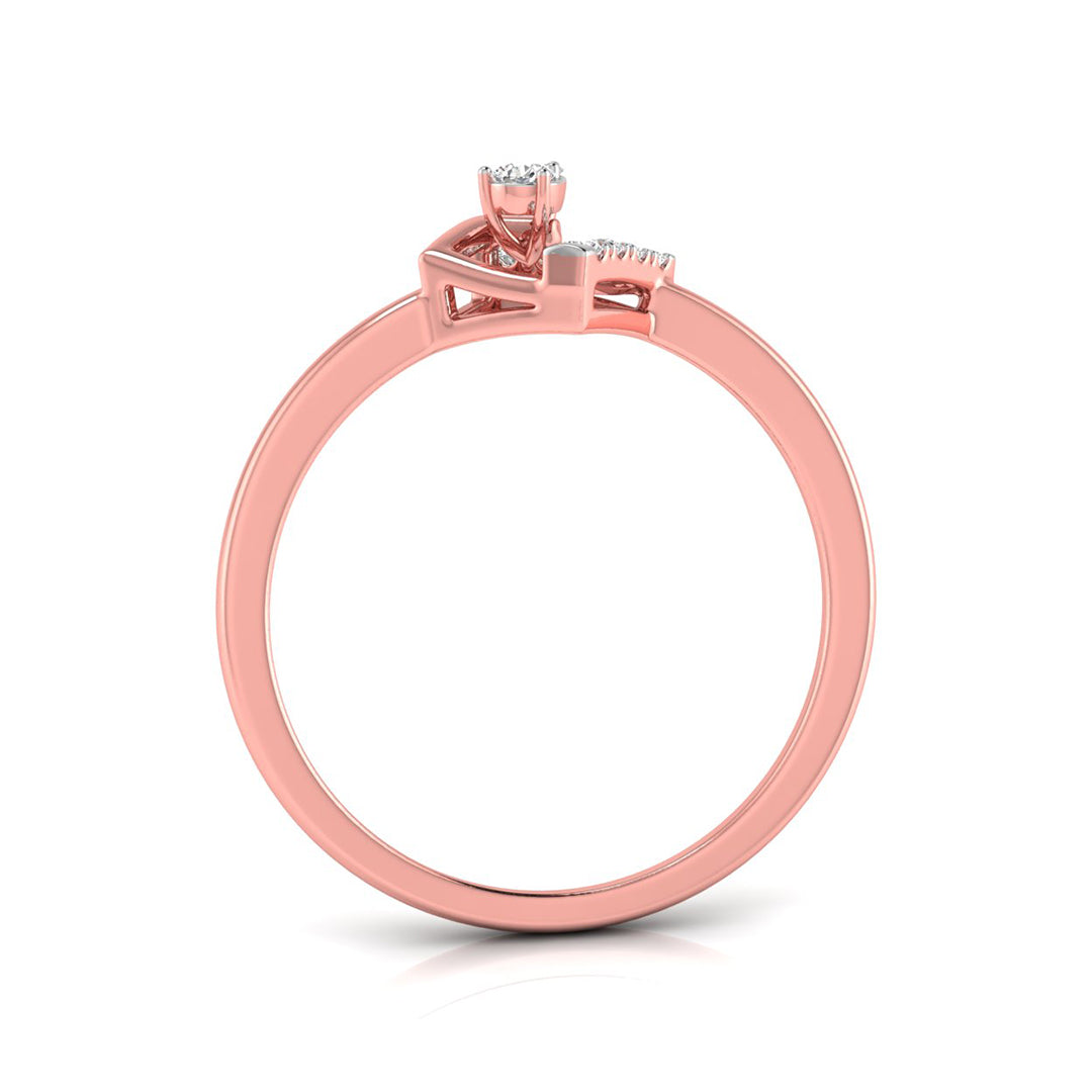 A rose gold ring with a bow-like top setting featuring a central round gemstone and small side stones, shown on a clean white background.