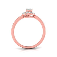 Rose gold ring with a round center stone and smaller accent stones on the shoulders, shown on a clean white background.