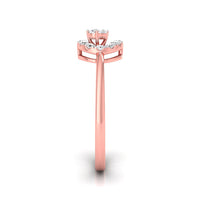 A rose gold ring with a floral crown setting featuring small clear stones, shown on a clean white background with a soft shadow.