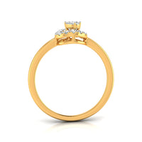 A yellow gold ring with a three-stone cluster setting featuring clear gemstones, shown from a side profile view on a white background with a soft reflection.