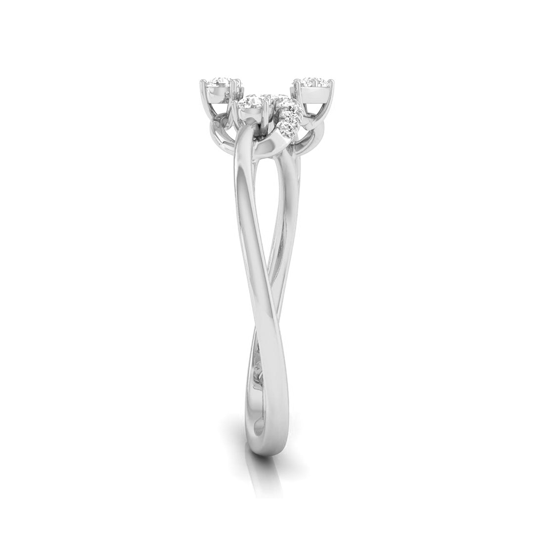 A silver-tone diamond ring with a three-stone setting featuring a central round diamond and two smaller round diamonds, shown on a clean white background. white gold