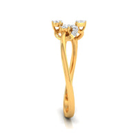 A yellow gold ring with a unique twisted band design and a cluster of small clear gemstones at the top, shown on a plain white background.
