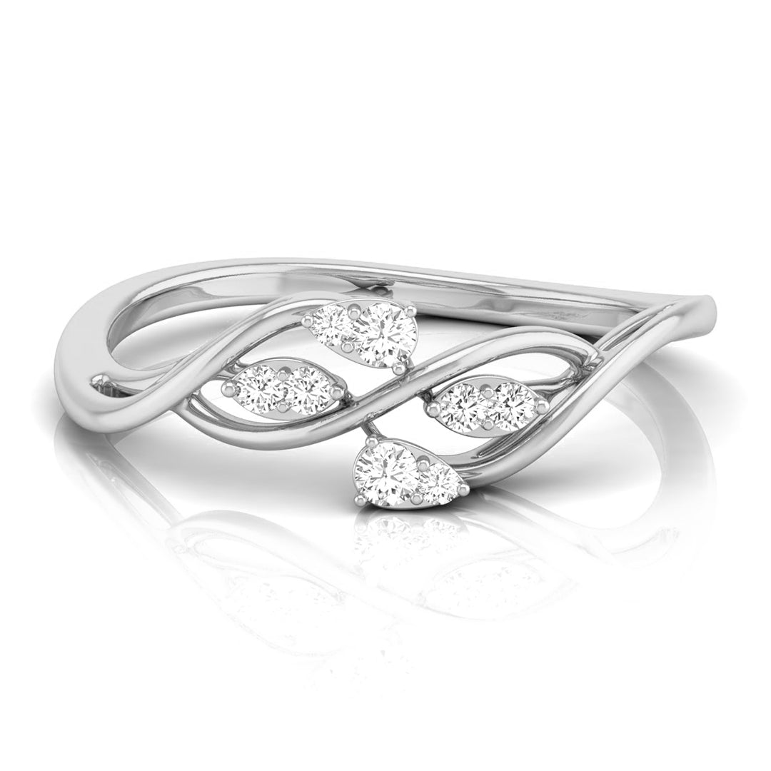 A silver-toned wave ring featuring small leaf-shaped clusters of clear round-cut gemstones, displayed on a clean white background with a soft reflection. white gold