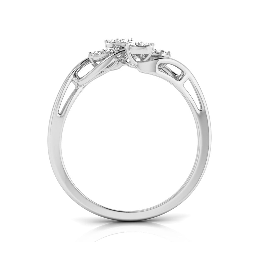 A silver-toned diamond engagement ring shown from a side profile view on a clean white background. white gold