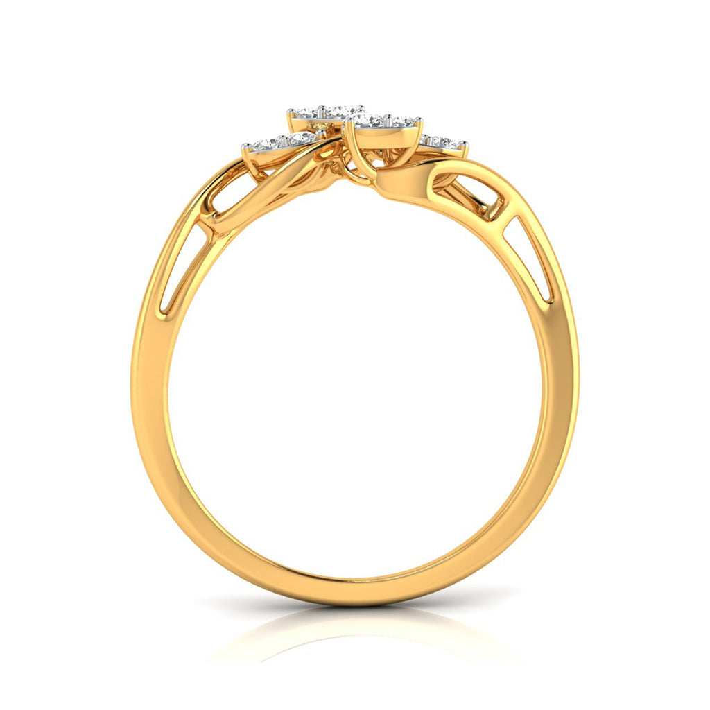 A yellow gold ring with a cluster of small clear gemstones at the top, shown from a side angle on a white background.