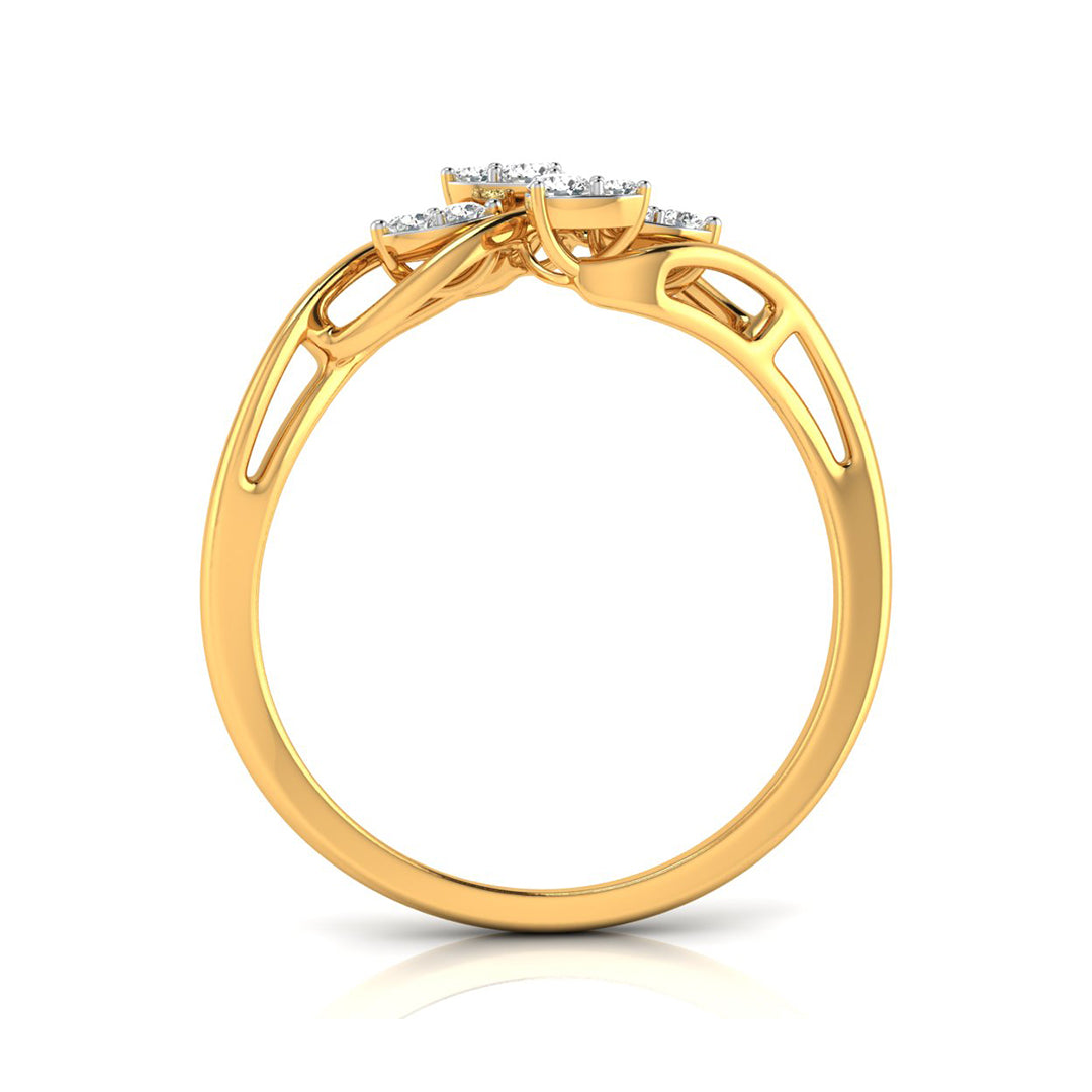 A yellow gold ring with a cluster of small clear gemstones at the top, shown from a side angle on a white background.