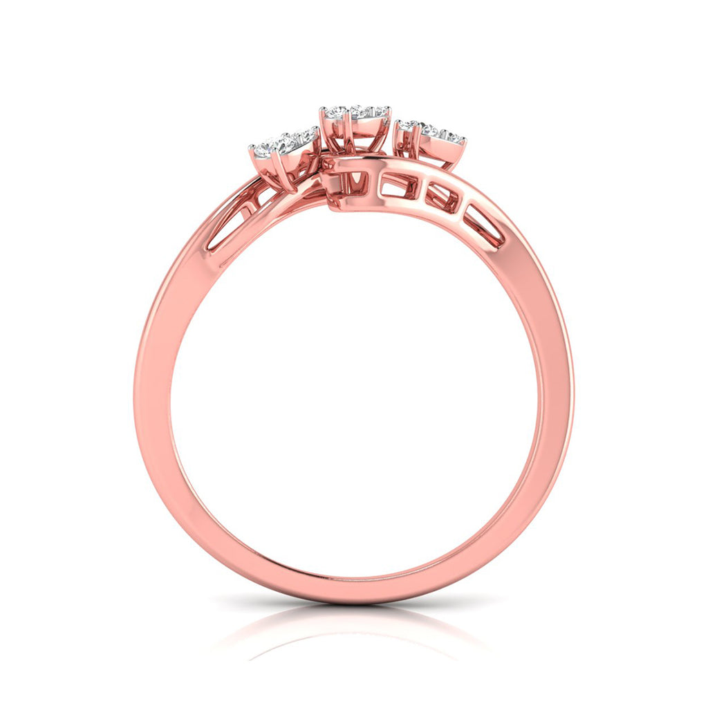 Rose gold ring with a three-stone cluster setting on a clean white background.