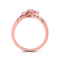 Rose gold ring with a three-stone cluster setting on a clean white background.