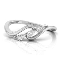 A silver infinity-style ring featuring three heart-shaped diamond clusters along the front, set against a clean white background with a soft reflection. white gold