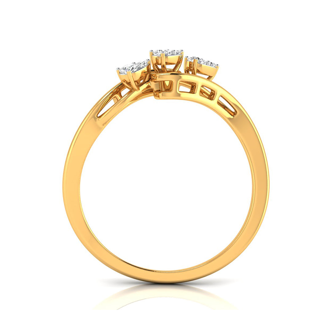 A yellow gold ring with a three-stone cluster setting, shown from a top-down perspective on a clean white background.