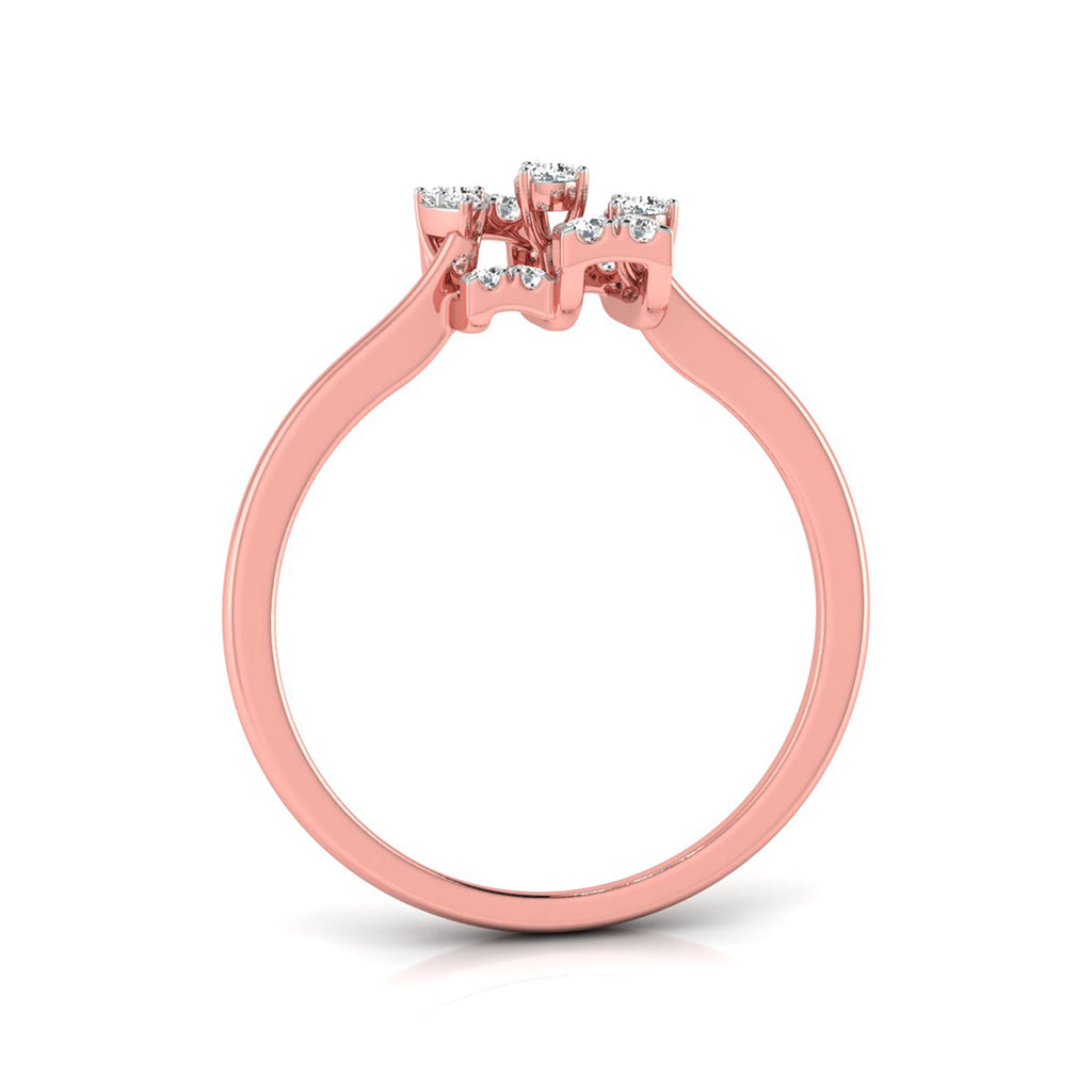 A rose gold ring with a cluster of small clear gemstones at the top, shown on a clean white background.