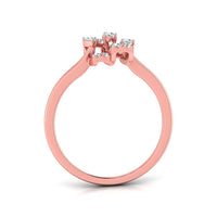 A rose gold ring with a cluster of small clear gemstones at the top, shown on a clean white background.