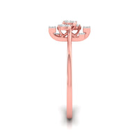 Rose gold ring setting viewed from the back, featuring a curved prong design with small clear gemstones, on a white background with a soft shadow.