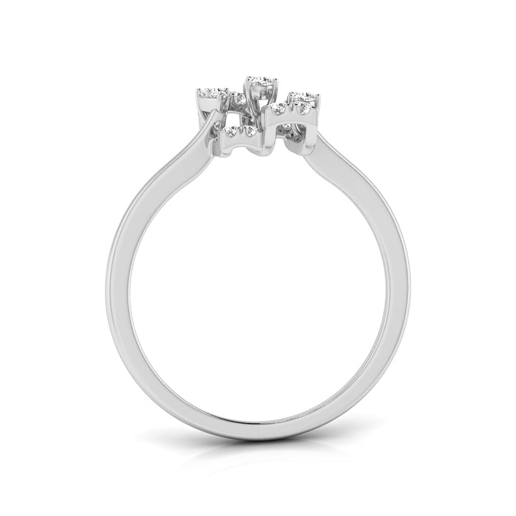 A silver-toned diamond ring with a three-stone cluster setting on a polished band, shown against a plain white background. white gold