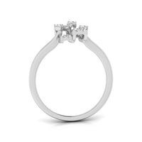 A silver-toned diamond ring with a three-stone cluster setting on a polished band, shown against a plain white background. white gold