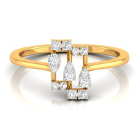 A yellow gold ring with a geometric diamond cluster setting, featuring pear-cut and round-cut diamonds on a clean white background with a soft reflection.