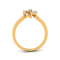 A yellow gold ring with a three-stone cluster setting featuring small clear gemstones, shown on a clean white background.