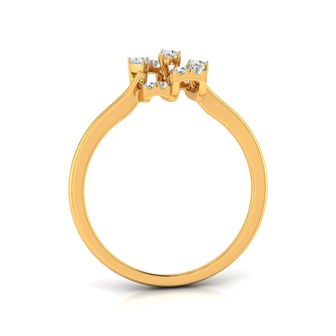 A yellow gold ring with a three-stone cluster setting featuring small clear gemstones, shown on a clean white background.
