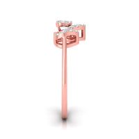 A rose gold diamond ring shown from a side profile view on a clean white background.