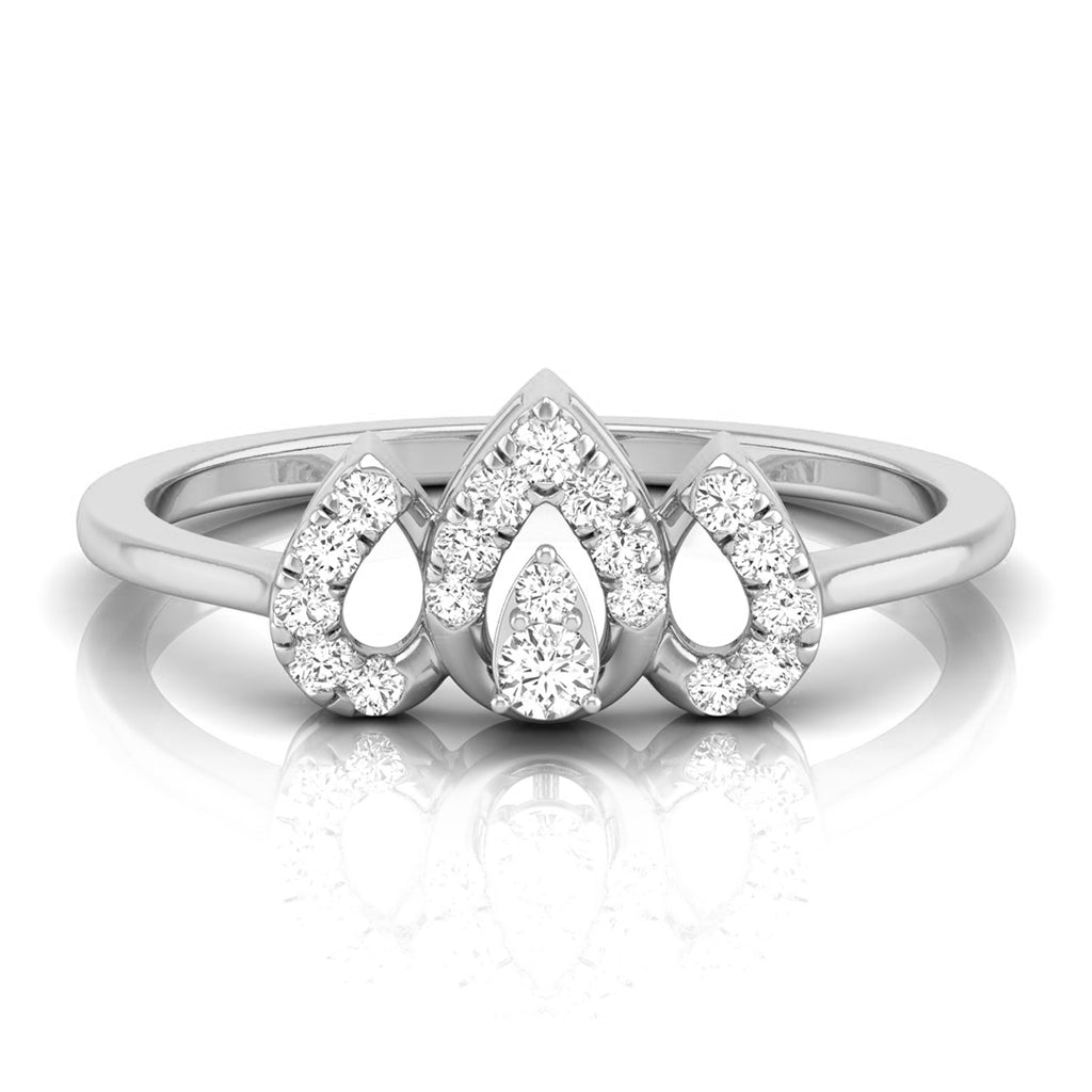 A silver three-stone diamond ring featuring pear-cut and round diamonds in a pavé setting, displayed on a clean white background with a soft reflection. white gold
