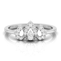 A silver three-stone diamond ring featuring pear-cut and round diamonds in a pavé setting, displayed on a clean white background with a soft reflection. white gold