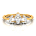 A yellow gold ring featuring three teardrop-shaped diamond clusters on a white background with a soft reflection.