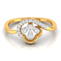 A yellow gold ring featuring a floral clover motif set with round and pear-cut diamonds, shown on a clean white background with a soft reflection.
