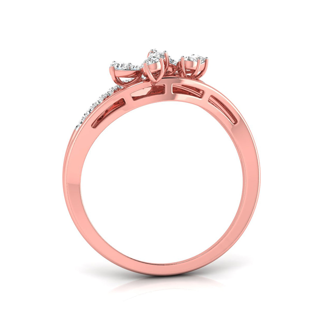 Rose gold ring with a bow-like top setting and small clear stones, shown on a clean white background.