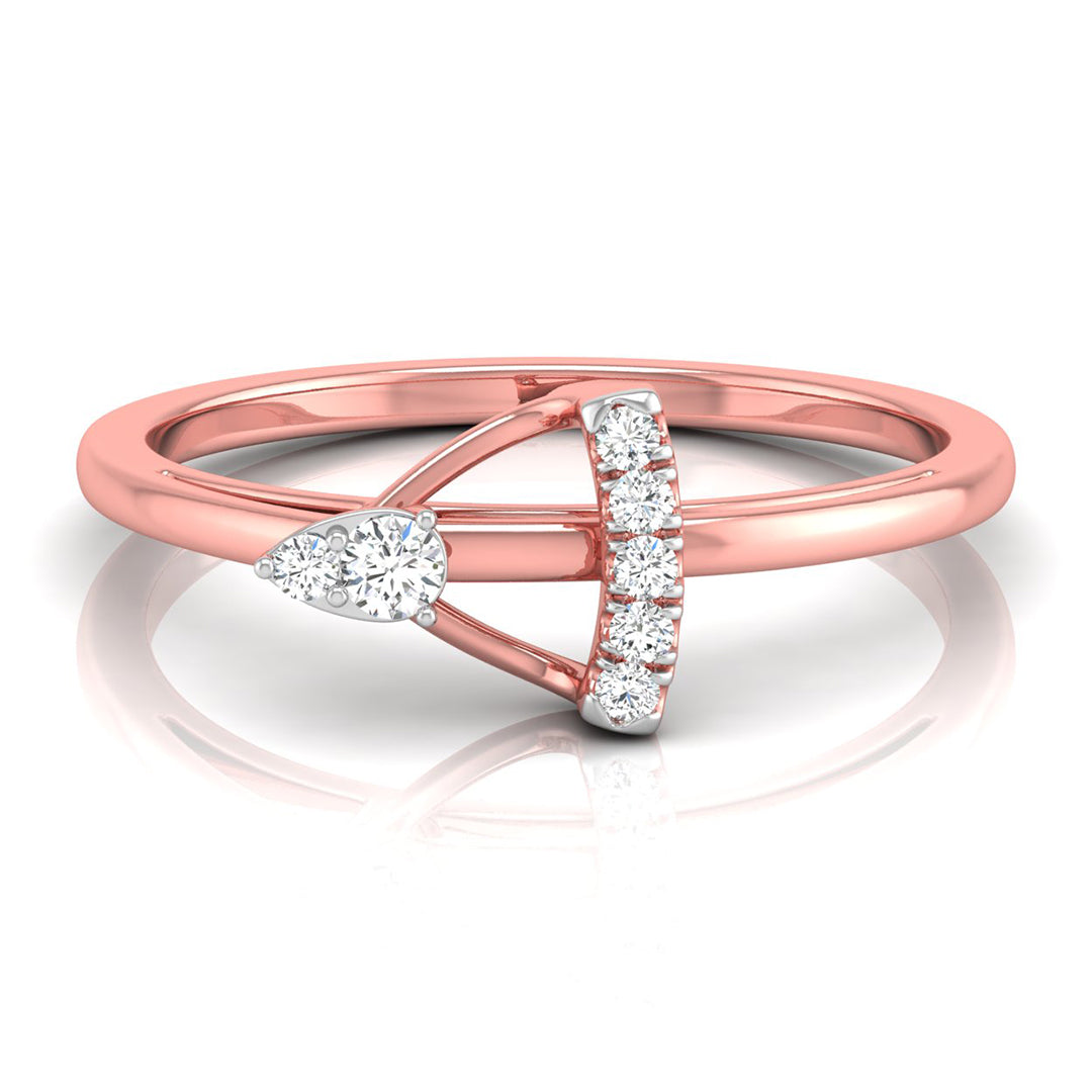 A rose gold ring with a geometric design featuring a pear-cut diamond on the left and a curved bar of round diamonds on the right, set against a clean white background with a soft reflection.