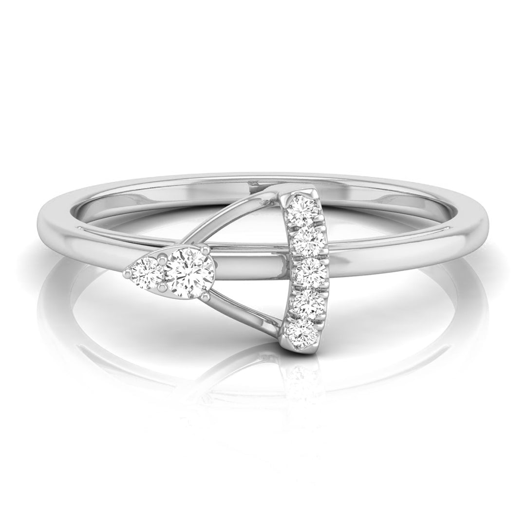 A white gold or platinum ring featuring a split design with a pear-cut diamond on one side and a curved bar of round diamonds on the other, set against a clean white background with a soft reflection. white gold
