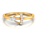 A yellow gold ring with a geometric design featuring a pear-cut diamond on one side and a curved row of round diamonds on the other, set against a clean white background with a soft reflection.