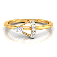 A yellow gold ring with a geometric design featuring a pear-cut diamond on one side and a curved row of round diamonds on the other, set against a clean white background with a soft reflection.