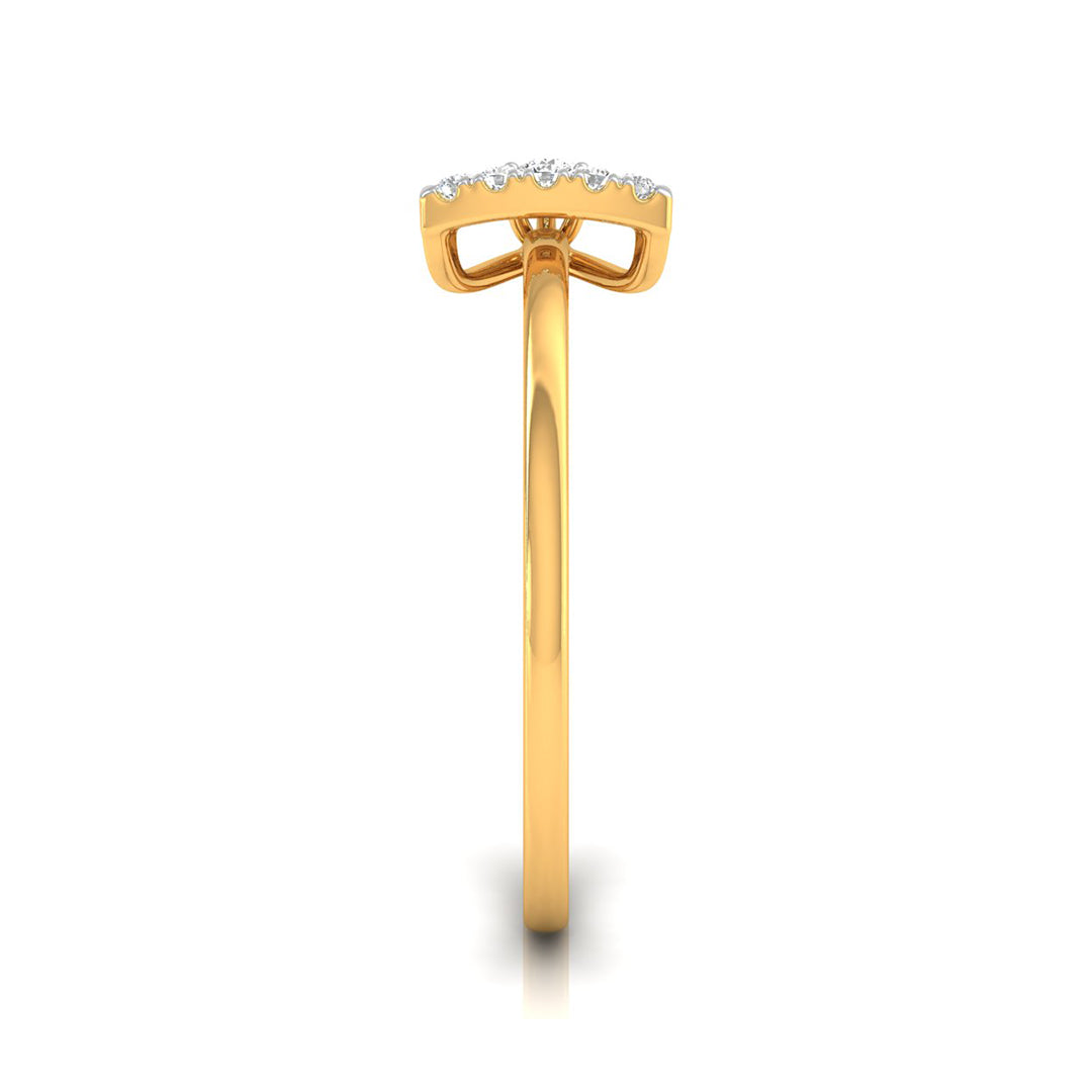 A yellow gold ring with a curved top set with small clear stones, shown from a side profile view on a white background.