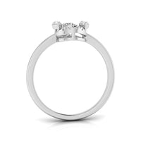 A silver three-stone diamond ring shown from the back, featuring a polished band and a crown with three small round-cut diamonds set in a three-prong setting, on a white background. white gold
