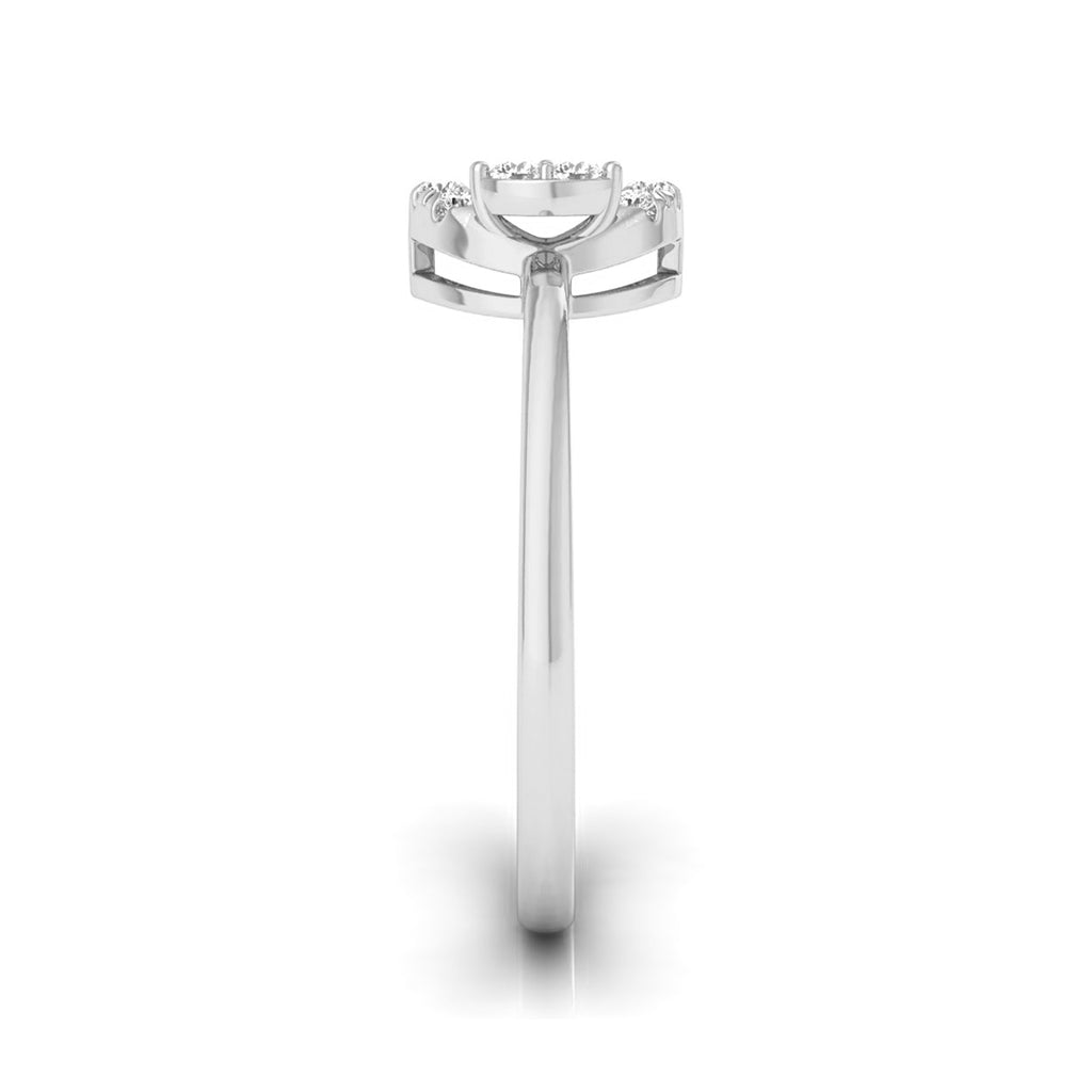 A silver-toned diamond ring shown from a top-down view on a clean white background. white gold