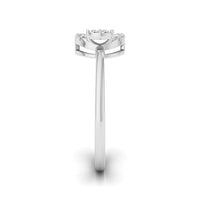 A silver-toned diamond ring shown from a top-down view on a clean white background. white gold