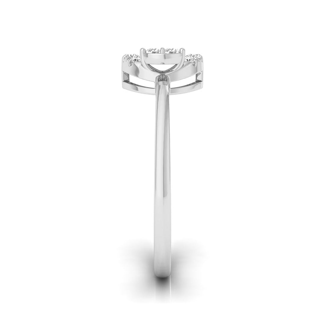 A silver-toned diamond ring shown from a top-down view on a clean white background. white gold