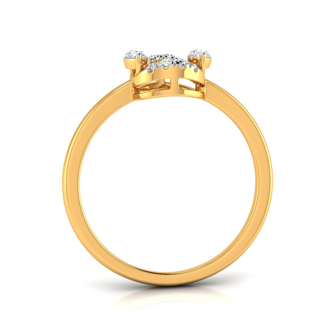 A yellow gold ring with a three-stone cluster of small clear diamonds on the top, shown from a side profile view against a white background.