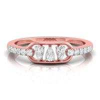 A rose gold ring featuring three central pear-cut diamonds flanked by smaller round diamonds on the band, set against a clean white background with a soft reflection.