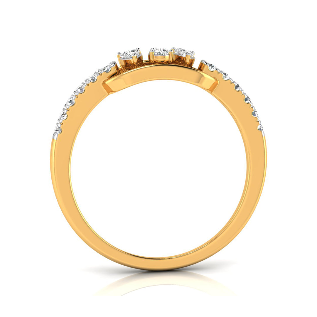 A yellow gold ring with three round-cut clear gemstones on top and a row of small pavé-set clear stones along the upper band, shown on a white background.