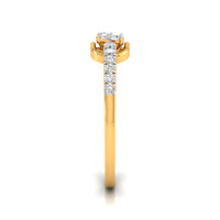 A yellow gold ring featuring a round-cut diamond center stone and a pavé band of smaller round diamonds, shown on a clean white background.
