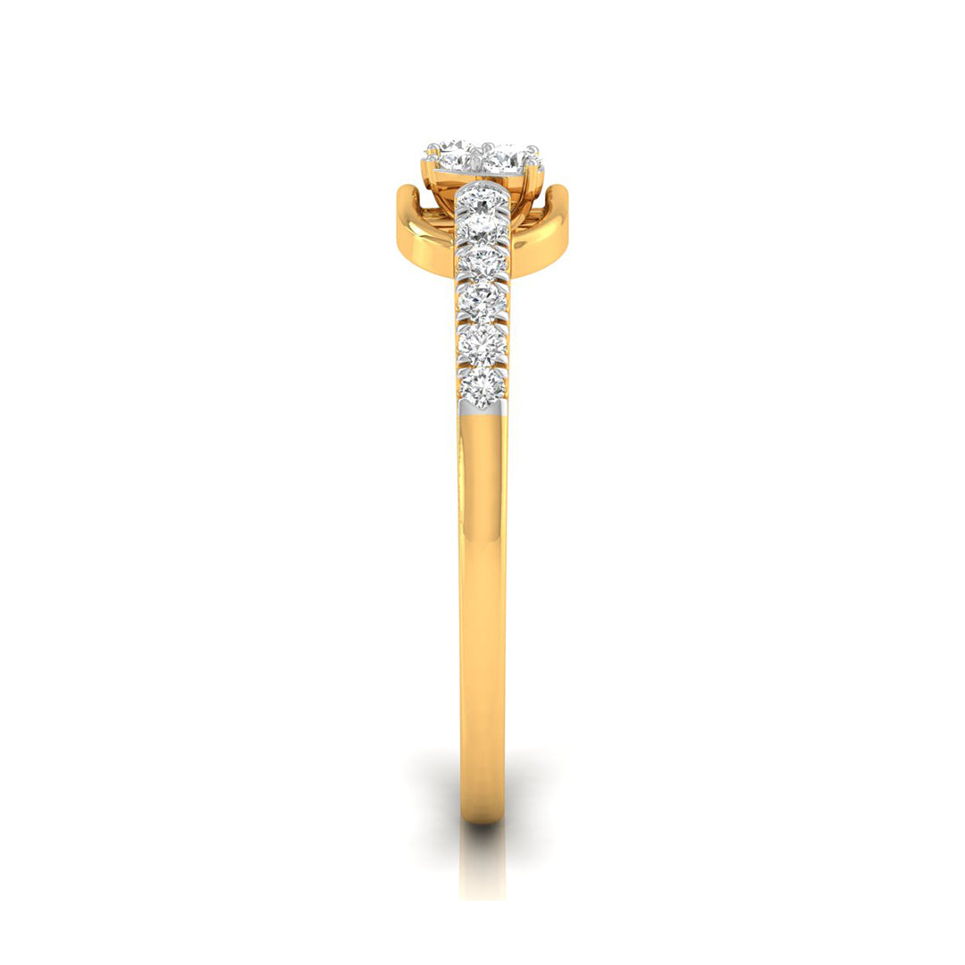 A yellow gold ring featuring a round-cut diamond center stone and a pavé band of smaller round diamonds, shown on a clean white background.