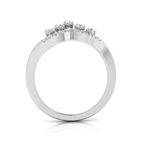 A silver-colored diamond ring shown from the back, featuring a curved row of five round-cut diamonds on a polished band, set against a clean white background with a soft reflection. white gold