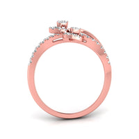 A rose gold ring with a pavé diamond band and a three-stone cluster setting on top, shown from a side angle on a white background.