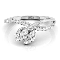 A silver-toned butterfly ring set with round and marquise-cut clear stones, shown on a clean white background with a soft reflection. white gold