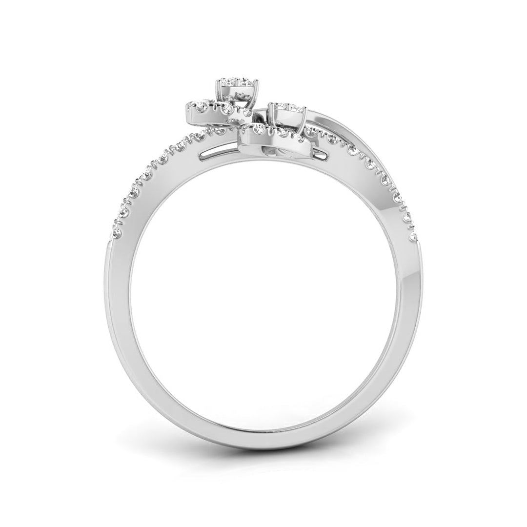 A silver-colored diamond ring with a three-stone cluster setting and pavé accents on the band, shown on a clean white background. white gold